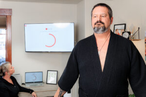 A patient completes a scan with the STYKU body composition machine before receiving injections with semaglutide in Coeur d’Alene.